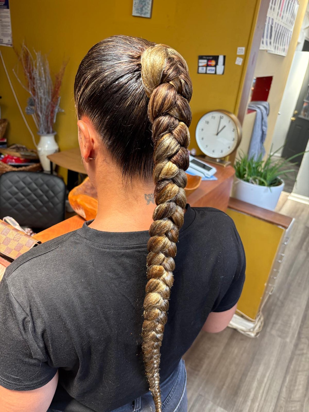 Sleek extra-long braided ponytail by Aoua's Braids